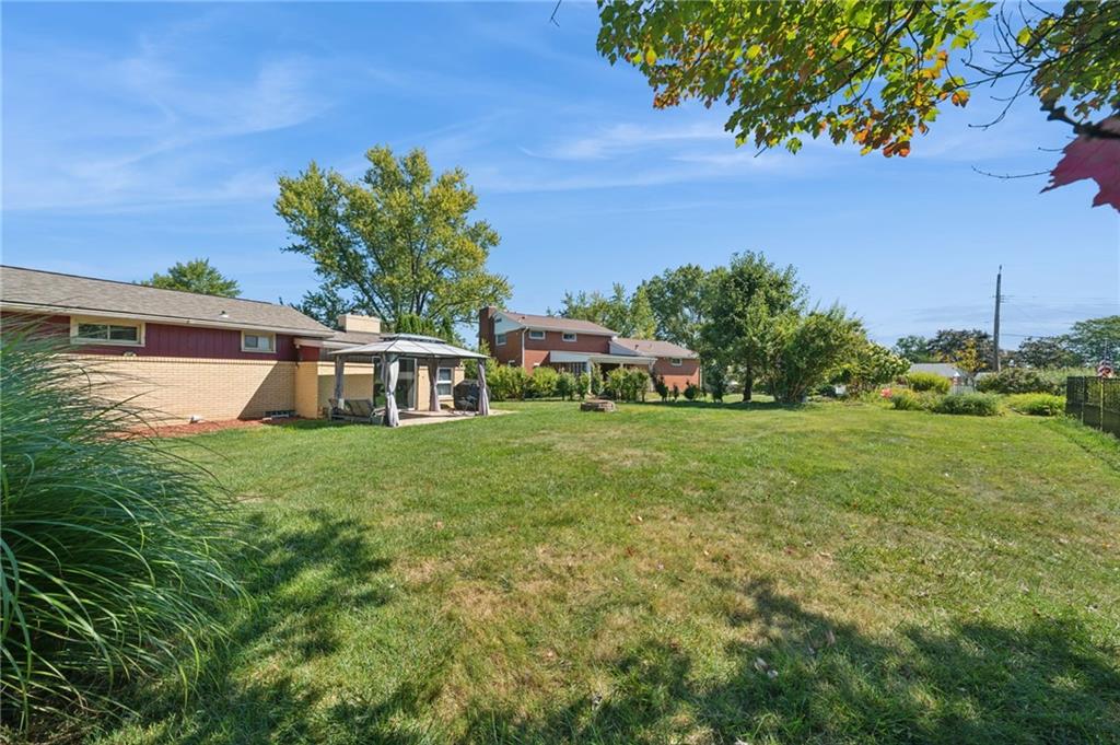 1202 Old Concord Road Monroeville, PA 15146 - Photo 24 of 27 a front view of a house with garden