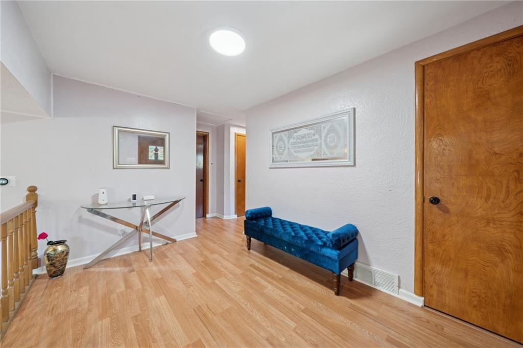 1202 Old Concord Road Monroeville, PA 15146 - Photo 4 of 27 a living room with furniture and a wooden floor