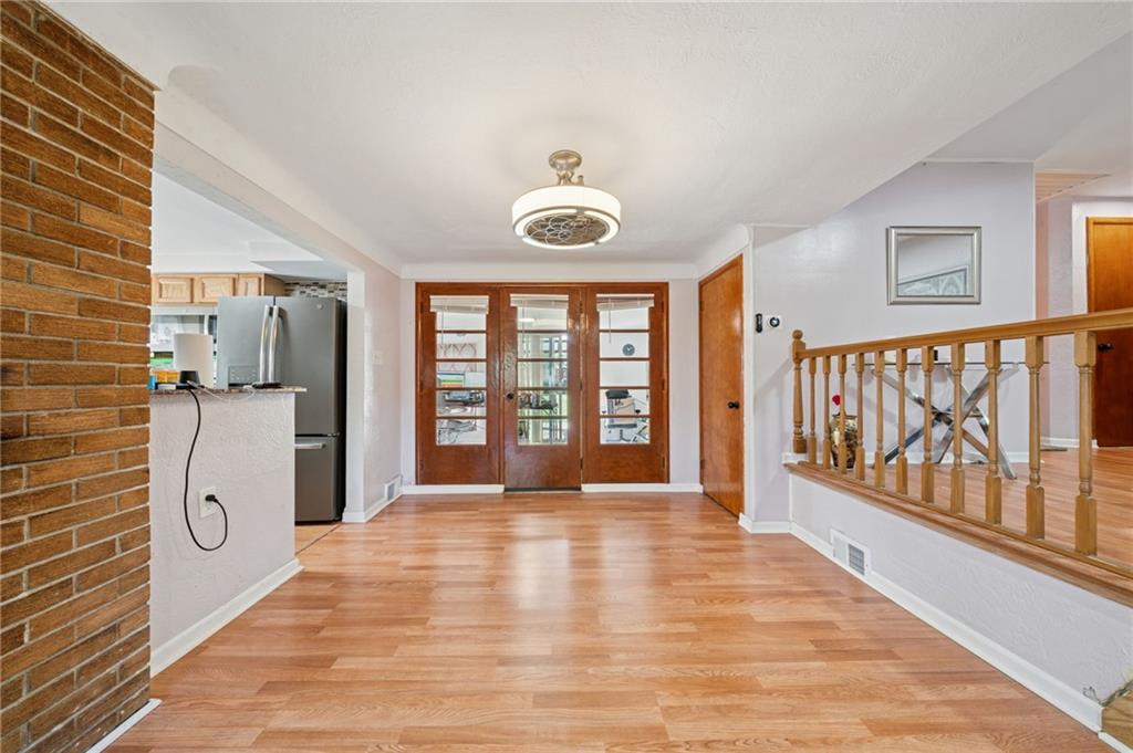 1202 Old Concord Road Monroeville, PA 15146 - Photo 7 of 27 a view of an empty room with a window