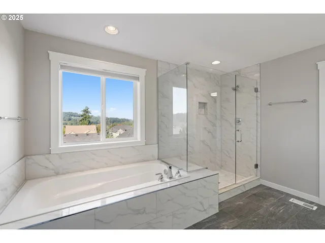 a bathroom with a double vanity sink mirror double and shower
