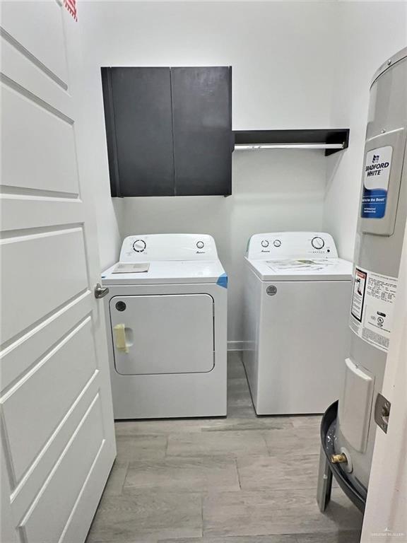 3912 Ventura Avenue, Unit 2 Edinburg, TX 78541 - Photo 9 of 12 a utility room with dryer and washer