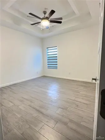 a kitchen with stainless steel appliances granite countertop a refrigerator a stove a sink and a microwave