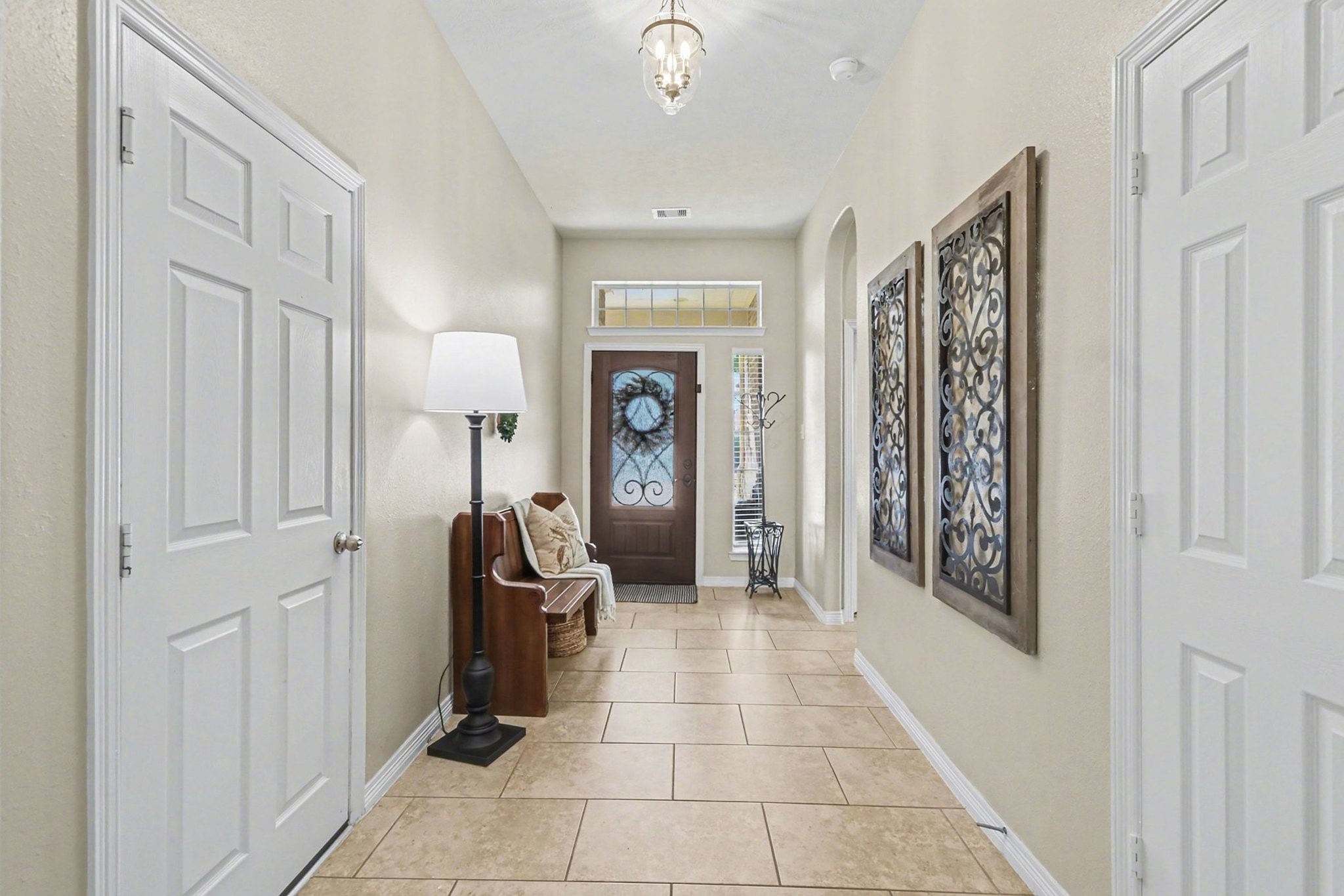 27006 Cliff Pointe Lane Katy, TX 77494 - Photo 5 of 34 A bright and airy foyer with thoughtful architectural details creates a gracious welcome and an easy flow throughout the home.