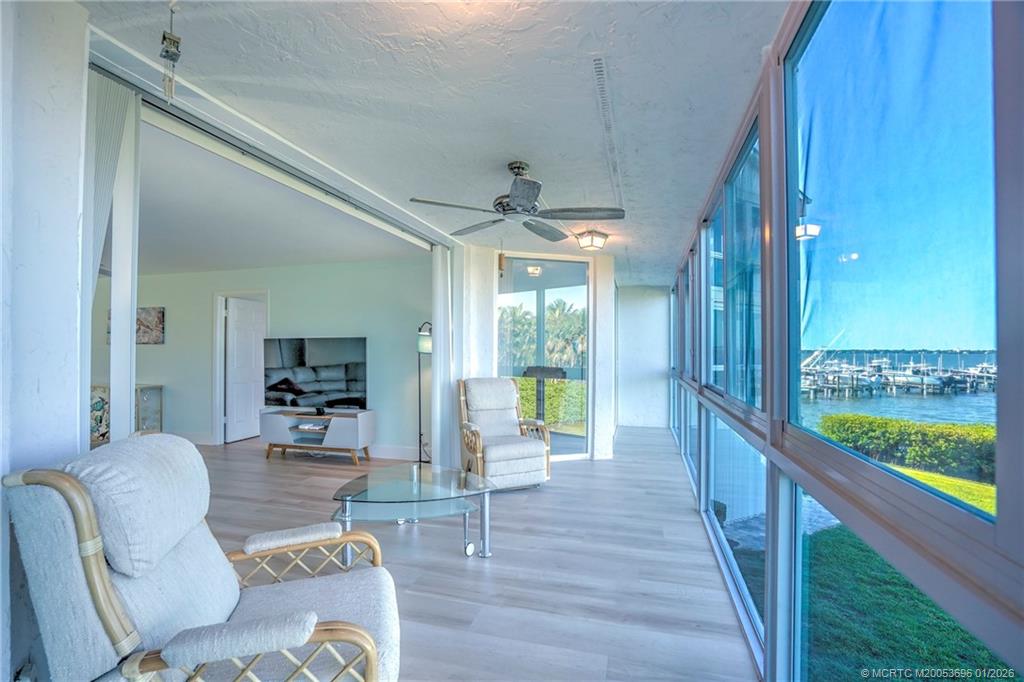 2370 Northeast Ocean Boulevard, Unit C205 Stuart, FL 34996 - Photo 12 of 80 a living room with furniture and a large window