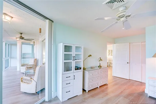 a view of a lake with houses in the back