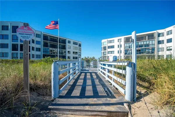 a bed room with furniture and a chandelier