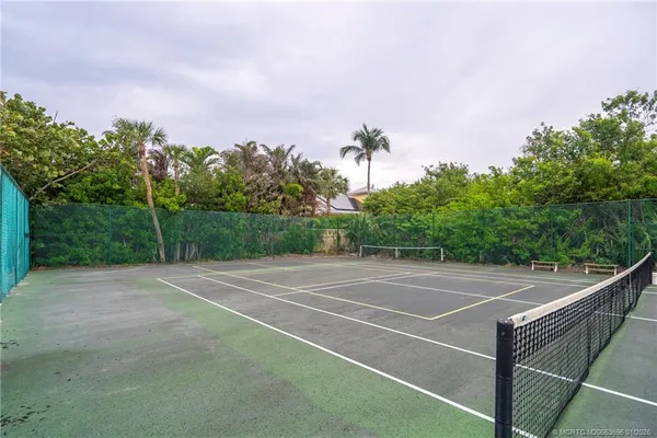 a view of a yard with a swimming pool