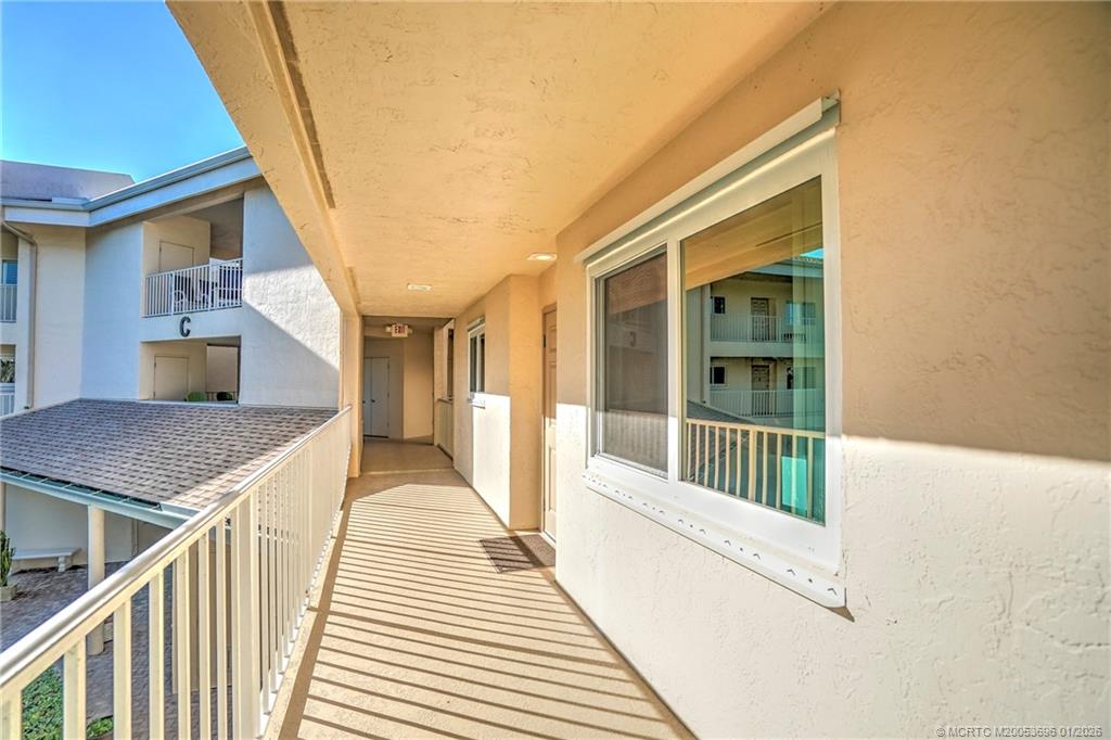 2370 Northeast Ocean Boulevard, Unit C205 Stuart, FL 34996 - Photo 8 of 80 a view of balcony with staircase