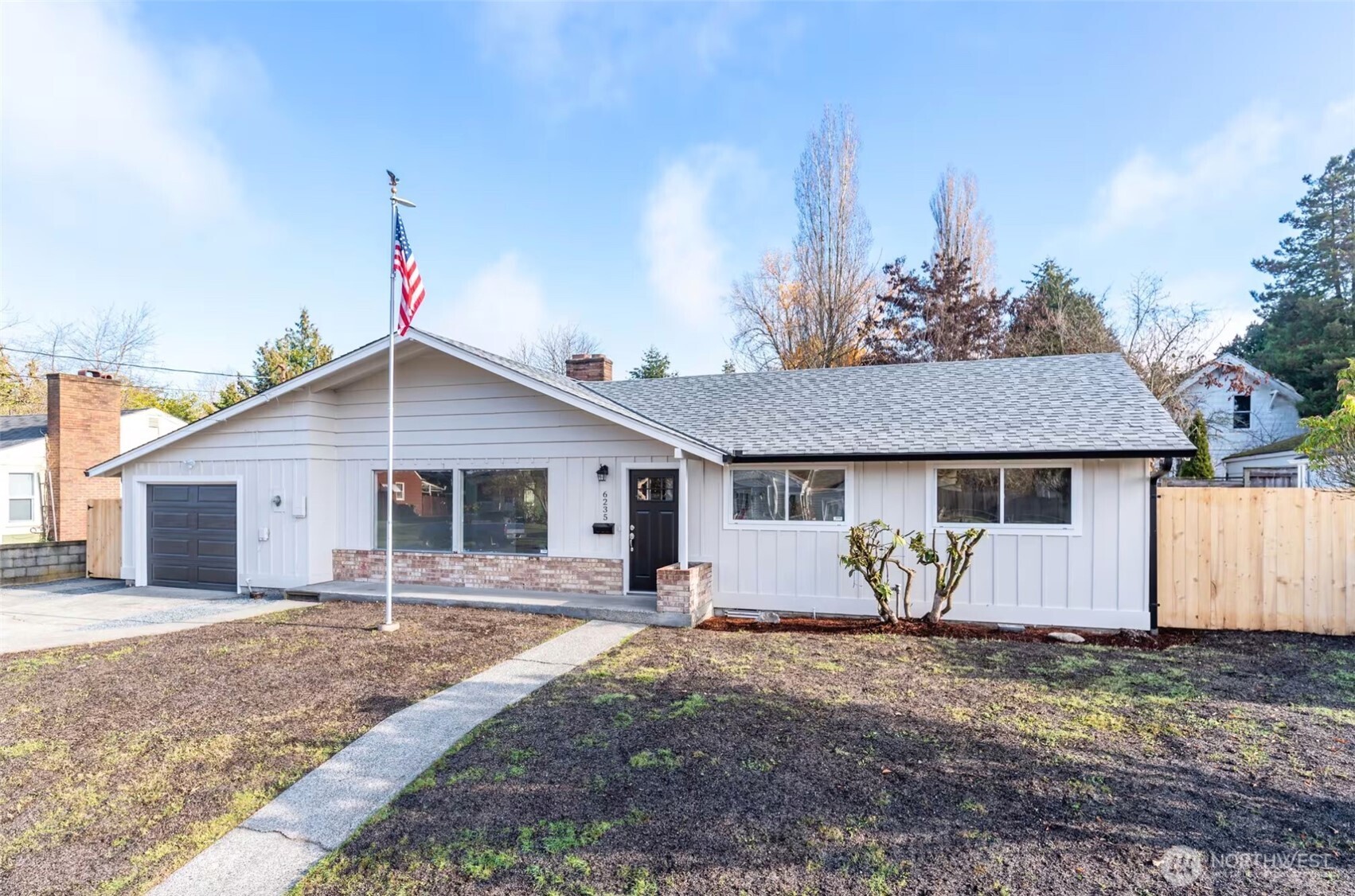 6235 A Street Tacoma, WA 98408 - Photo 2 of 12 a view of a house with yard and roof