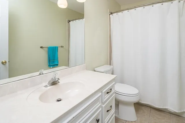 a bathroom with a sink and toilet