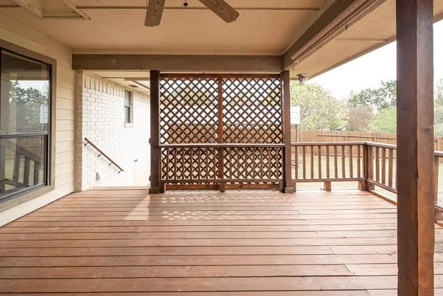 a view of wooden floor with a window