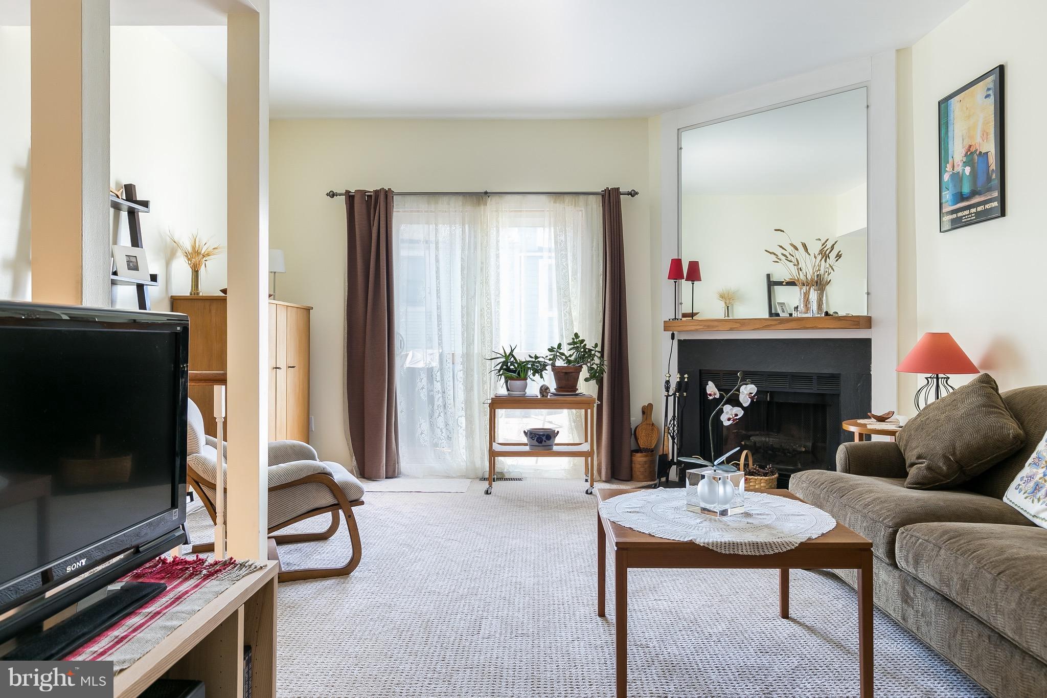 11905 Crosswind Court Reston, VA 20194 - Photo 6 of 22 Spacious Living Room opens to Large Deck