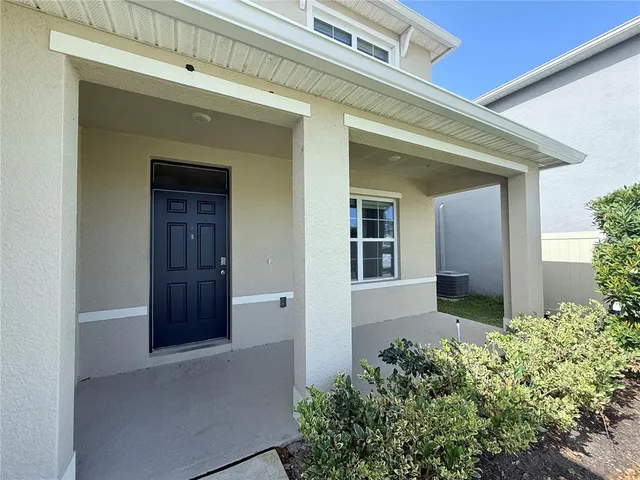 front view of a house with a small porch
