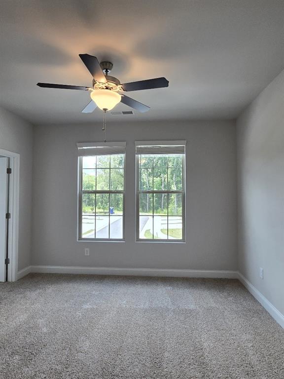 6198 Ripple Way, Unit 87 Atlanta, GA 30349 - Photo 13 of 23 an empty room with a window