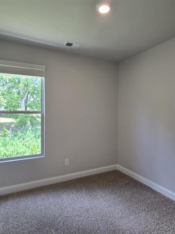 6198 Ripple Way, Unit 87 Atlanta, GA 30349 - Photo 20 of 23 a view of a room that has a window in it