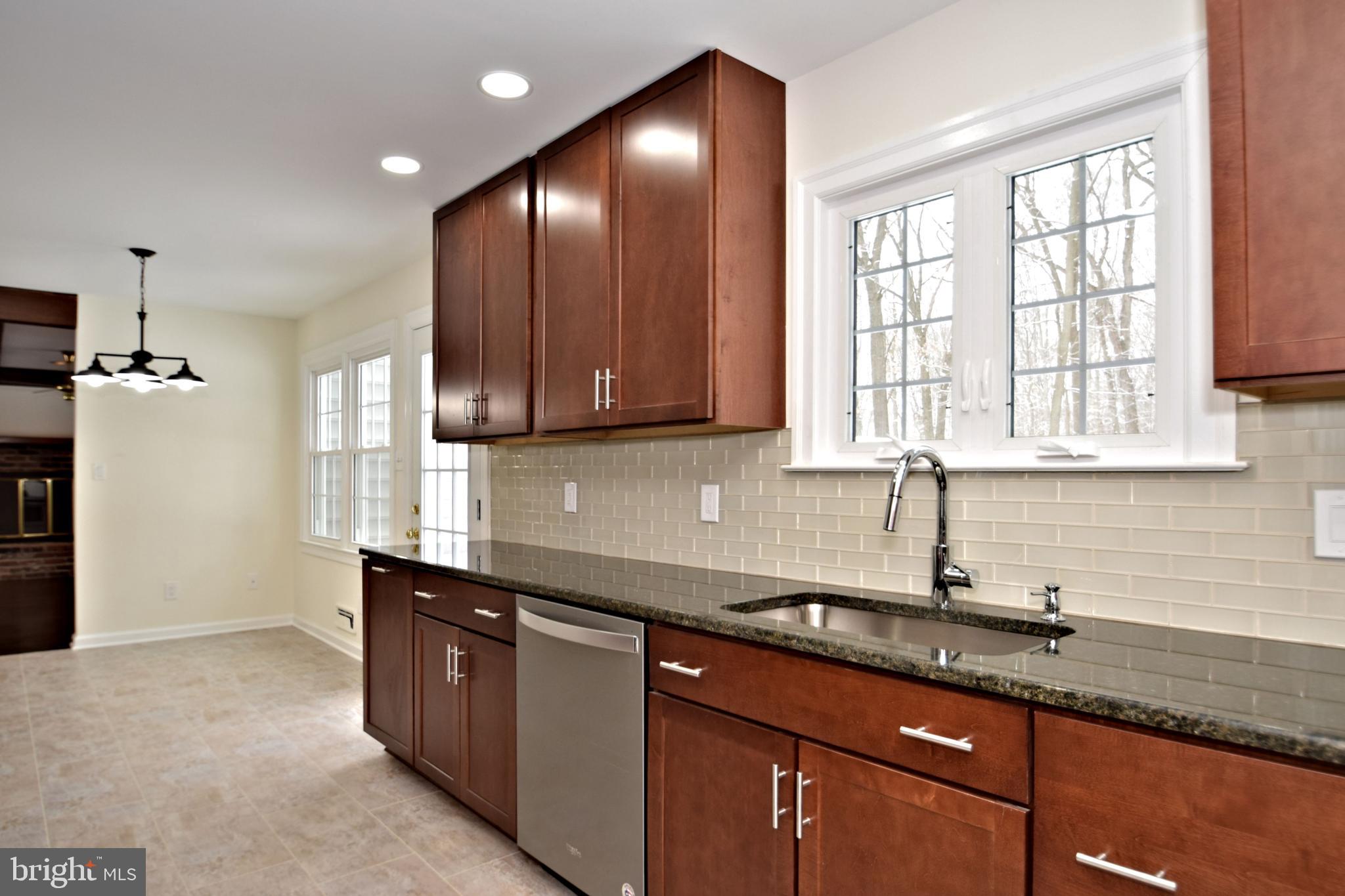 404 Sunset Road Burlington, NJ 08016 - Photo 11 of 72 Counter toward door to Patio