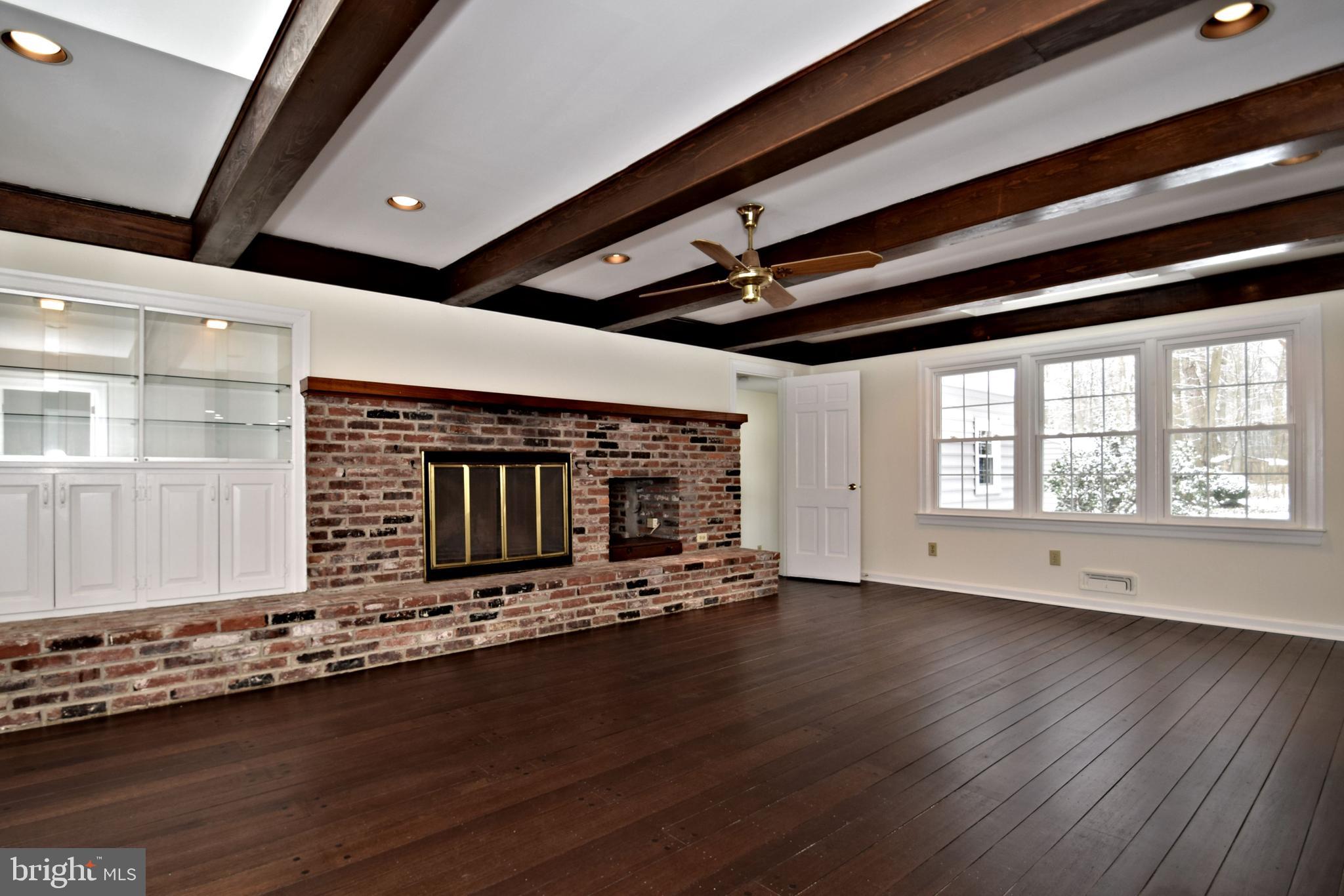 404 Sunset Road Burlington, NJ 08016 - Photo 20 of 72 Fire place, with built ins and lit glass shelves