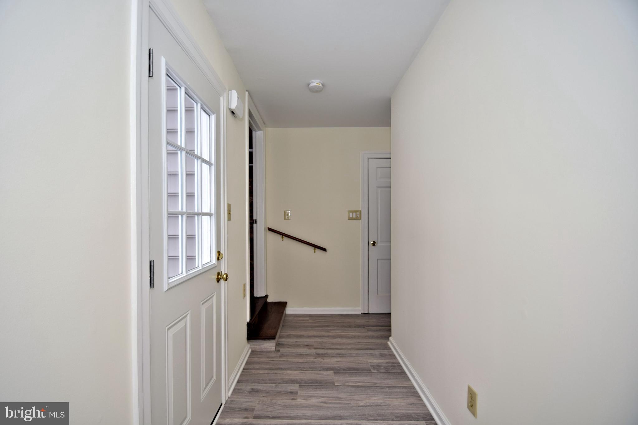 404 Sunset Road Burlington, NJ 08016 - Photo 29 of 72 Hallway from Family rm to Garage/Full bath In-law