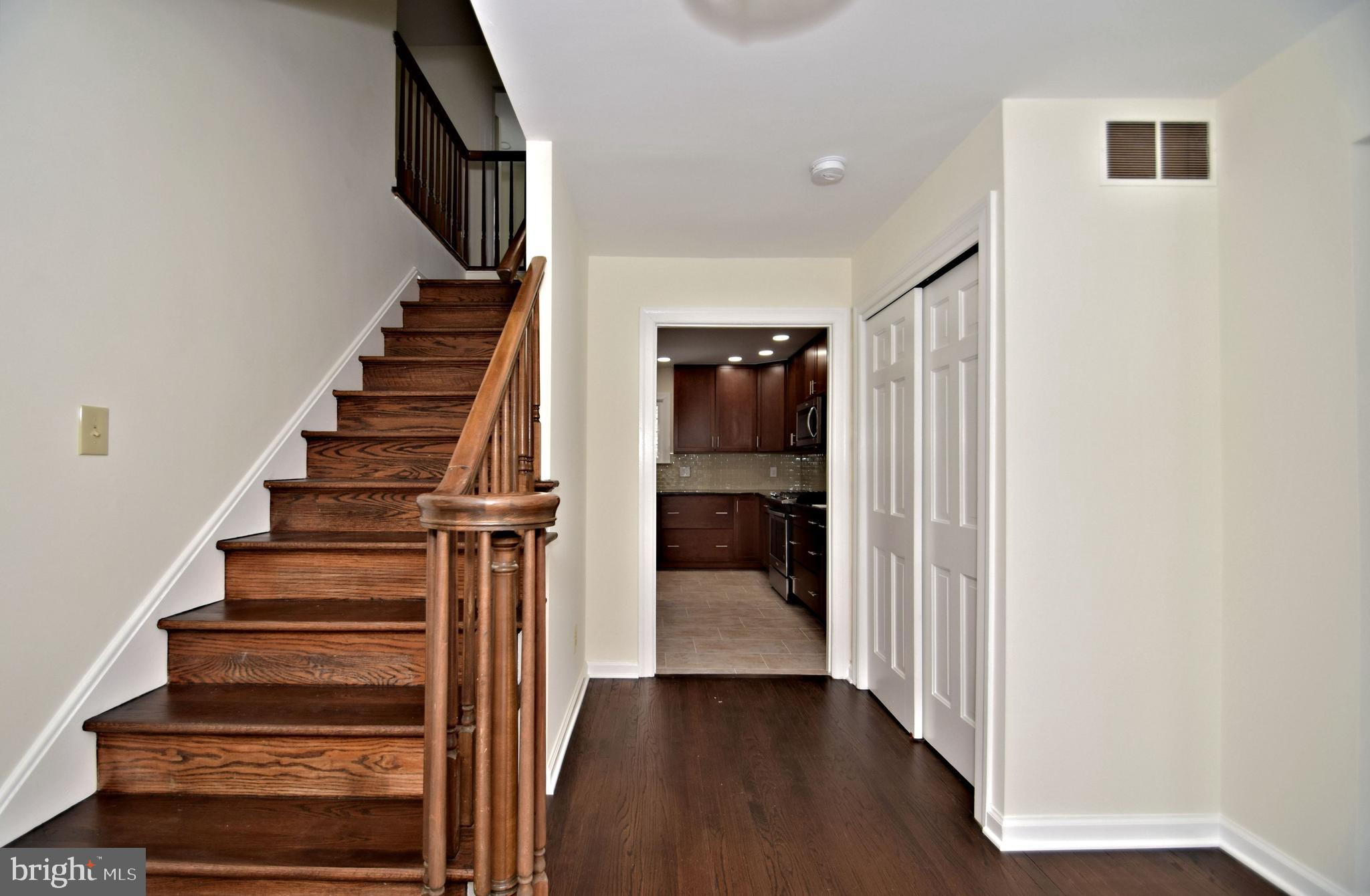 404 Sunset Road Burlington, NJ 08016 - Photo 5 of 72 Foyer with coat closet leads to Kitchen