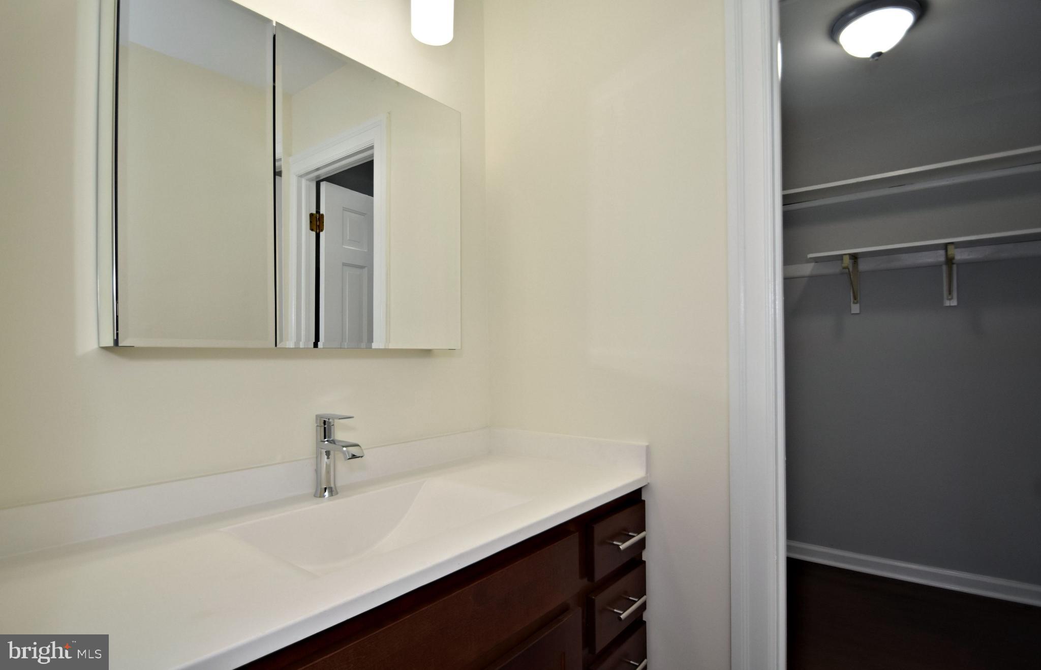 404 Sunset Road Burlington, NJ 08016 - Photo 43 of 72 Walk in closet & Make-up sink area