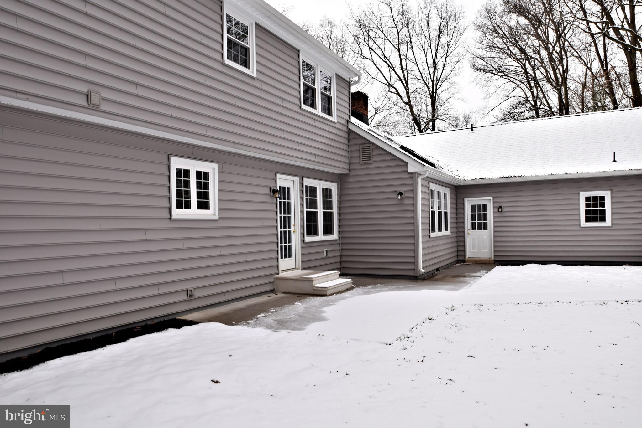 404 Sunset Road Burlington, NJ 08016 - Photo 64 of 72 Kitchen entry from patio and path to in-law
