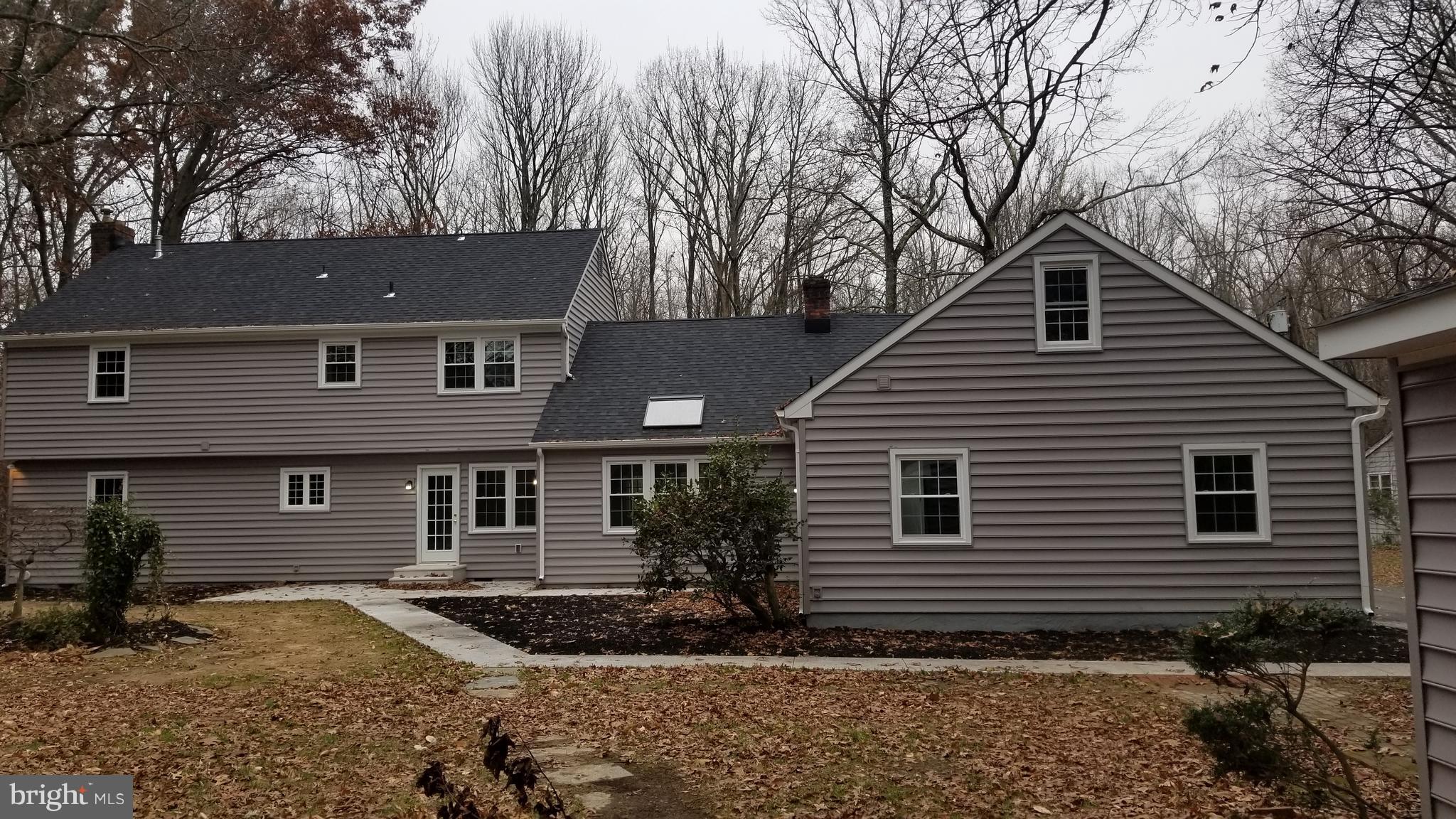 404 Sunset Road Burlington, NJ 08016 - Photo 70 of 72 Rear facade, new concrete patio & paths