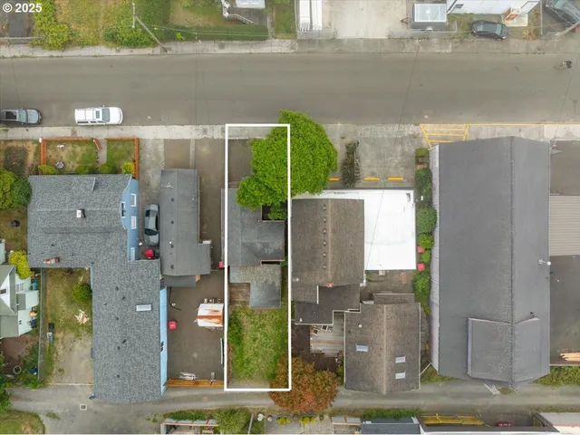 a view of a street with a building