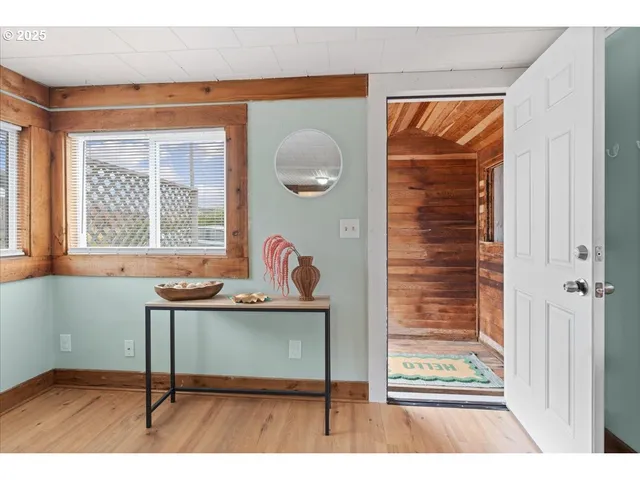 a view of a livingroom with furniture and window