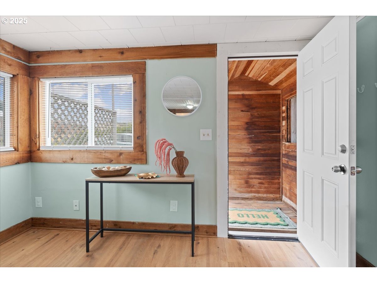 830 Oceanway Street Seaside, OR 97138 - Photo 3 of 35 a view of a livingroom with furniture and window