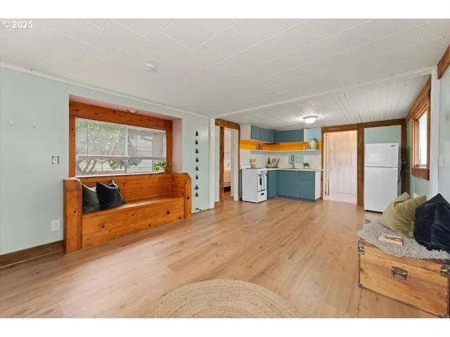 a bedroom with furniture and window