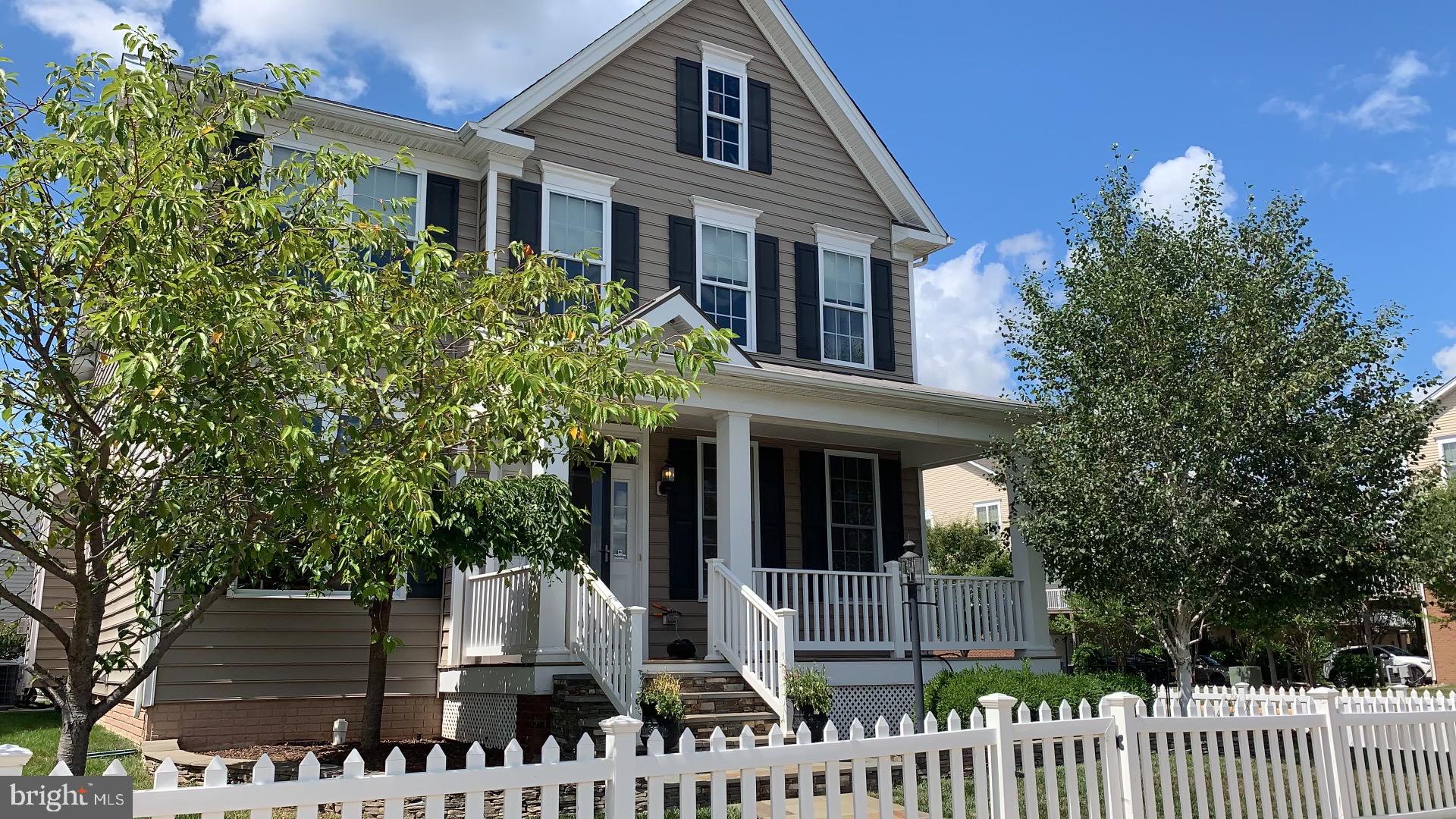 Charming home with inviting porch.