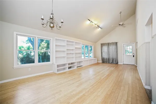 a view of an empty room with a window