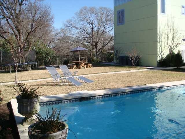 2716 East 22nd Street, Unit A Austin, TX 78722 - Photo 11 of 11 a view of a lake with a house