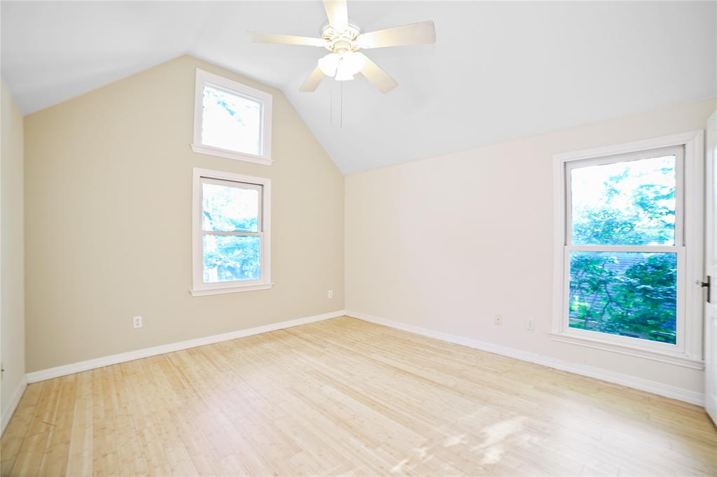 2716 East 22nd Street, Unit A Austin, TX 78722 - Photo 9 of 11 an empty room with a window