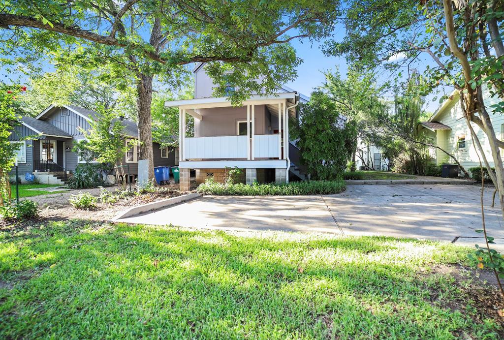 2716 East 22nd Street, Unit A Austin, TX 78722 - Photo 10 of 11 a view of a house with a yard