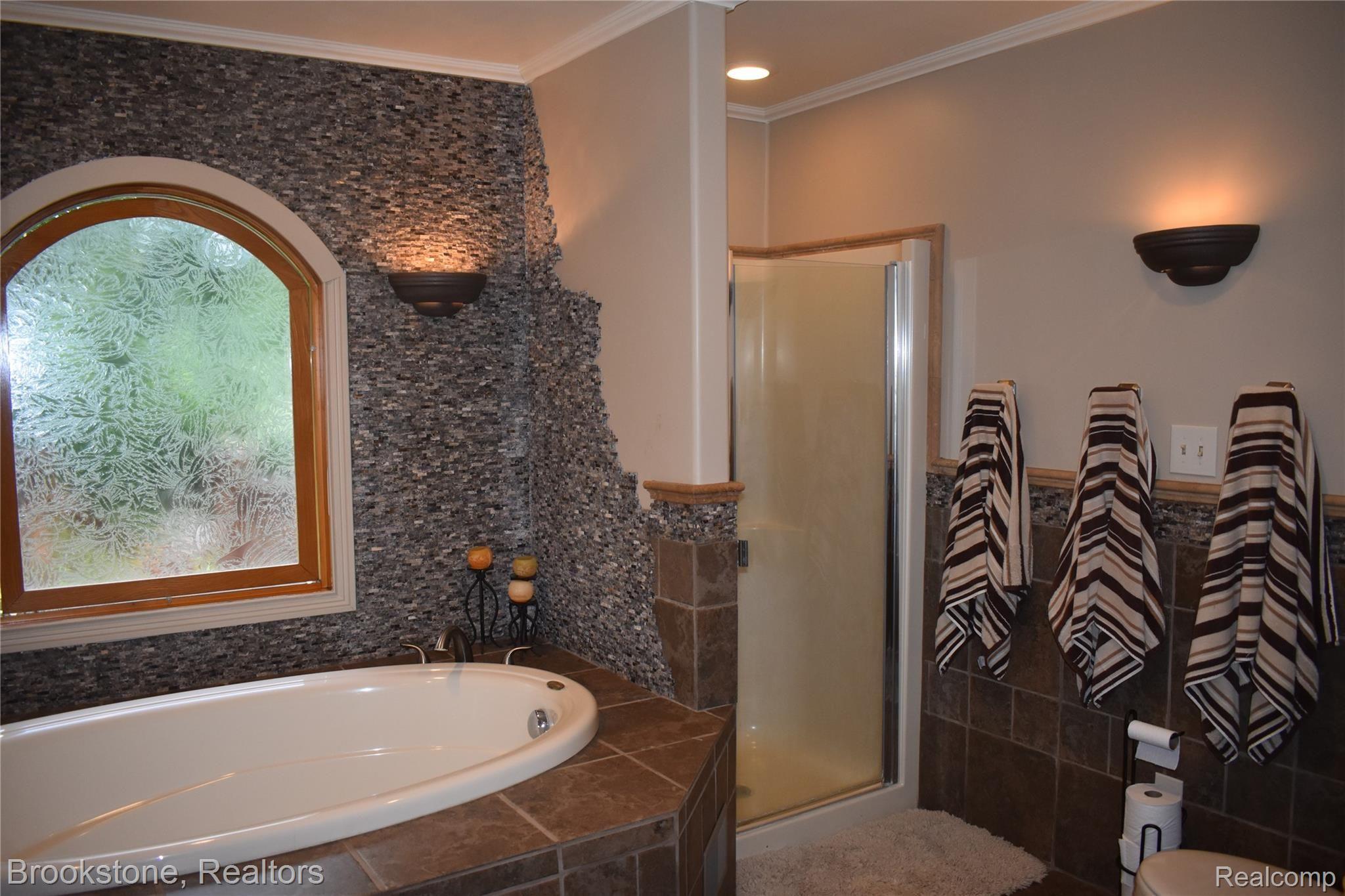 405 Baldwin Ridge Oxford, MI 48371 - Photo 42 of 54 CHECKOUT THE SHOWER IN THE CHILDREN'S LARGE FULL BATH (11X12)