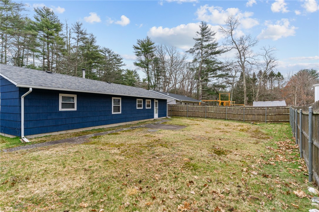 25 Town Farm Road Coventry, RI 02816 - Photo 27 of 31 View of the fully-fenced backyard