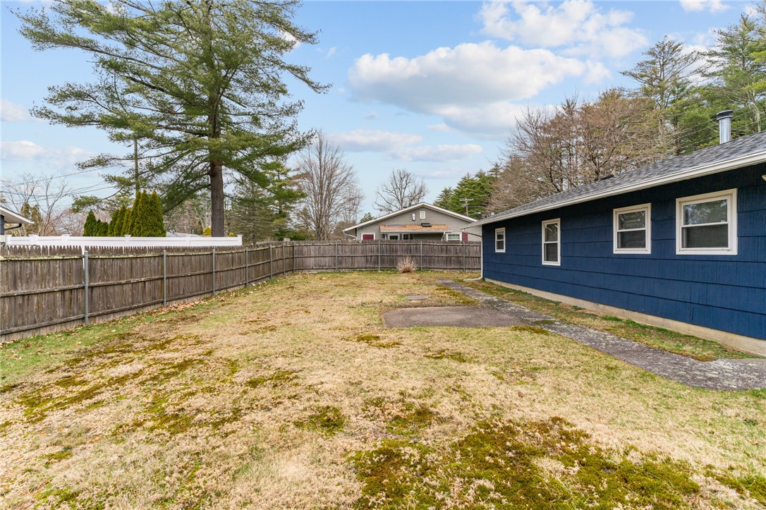 25 Town Farm Road Coventry, RI 02816 - Photo 28 of 31 View of the fully-fenced backyard