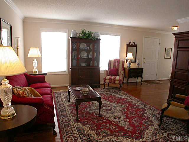 8400 Metronome Lane Raleigh, NC 27613 - Photo 4 of 25 Formal Living rooom, Gleaming hardwood floors