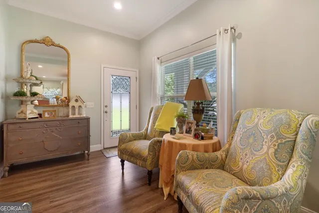 a living room with furniture and a window