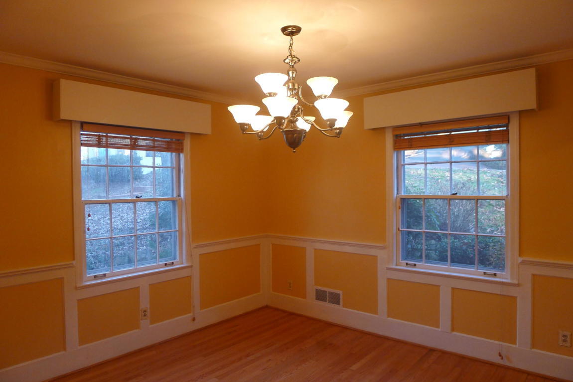 3125 Stoneridge Road Southwest Roanoke, VA 24014 - Photo 6 of 28 a view of an empty room with wooden floor and a window