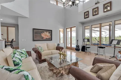 a bedroom with bed and window