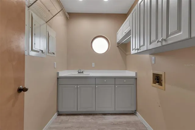 a view of a swimming pool with a lounge chairs