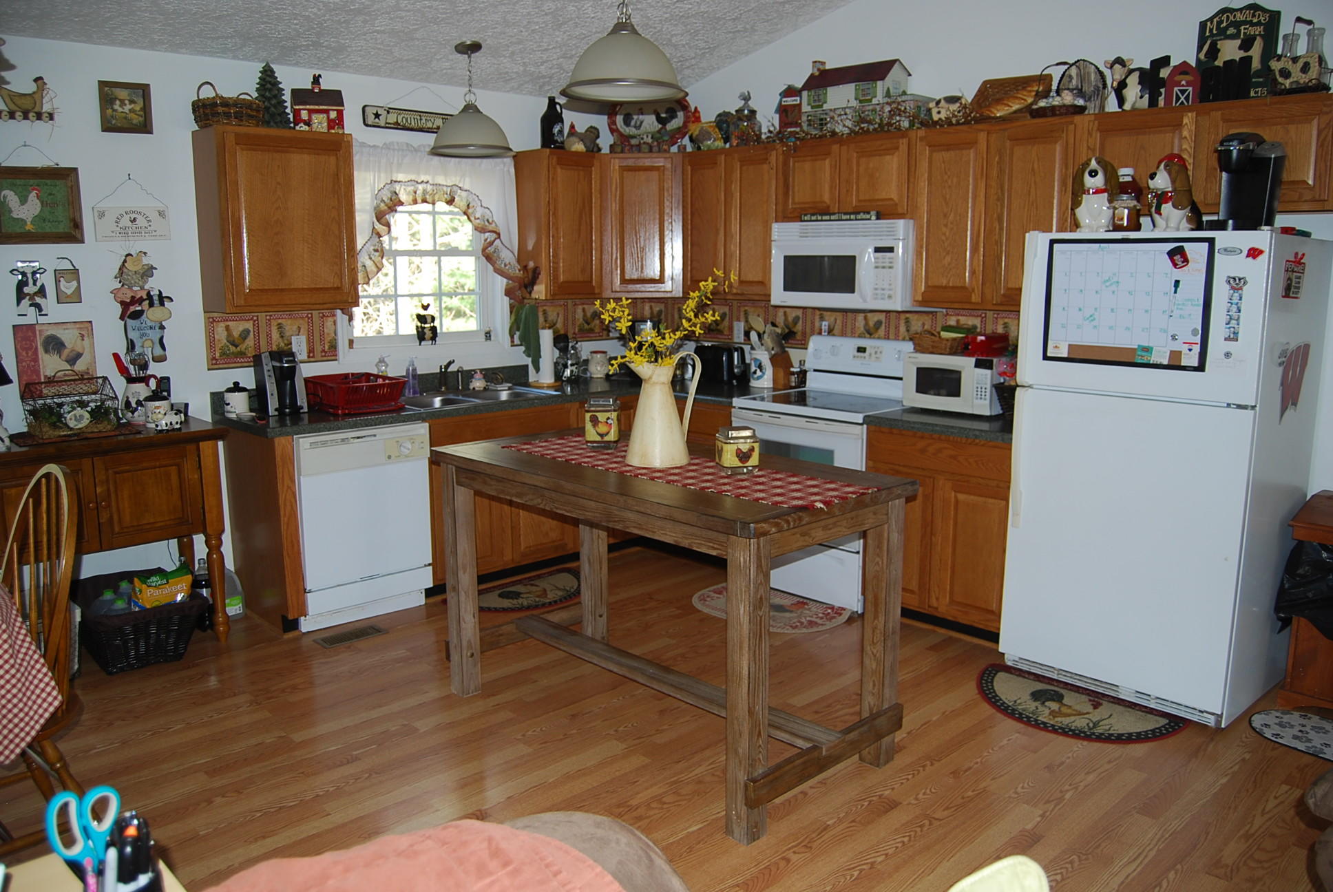 736 Holland Road Callaway, VA 24067 - Photo 11 of 45 a kitchen with furniture a counter top space and stainless steel appliances