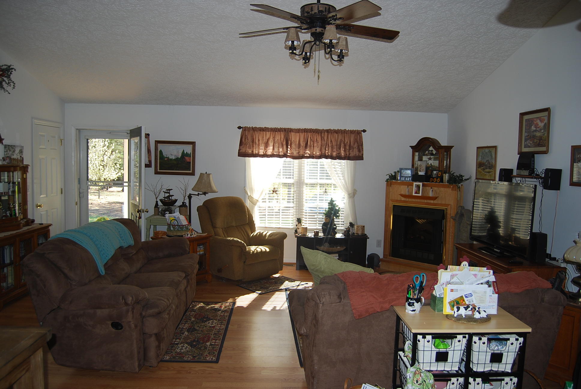 736 Holland Road Callaway, VA 24067 - Photo 12 of 45 a living room with furniture and a fireplace