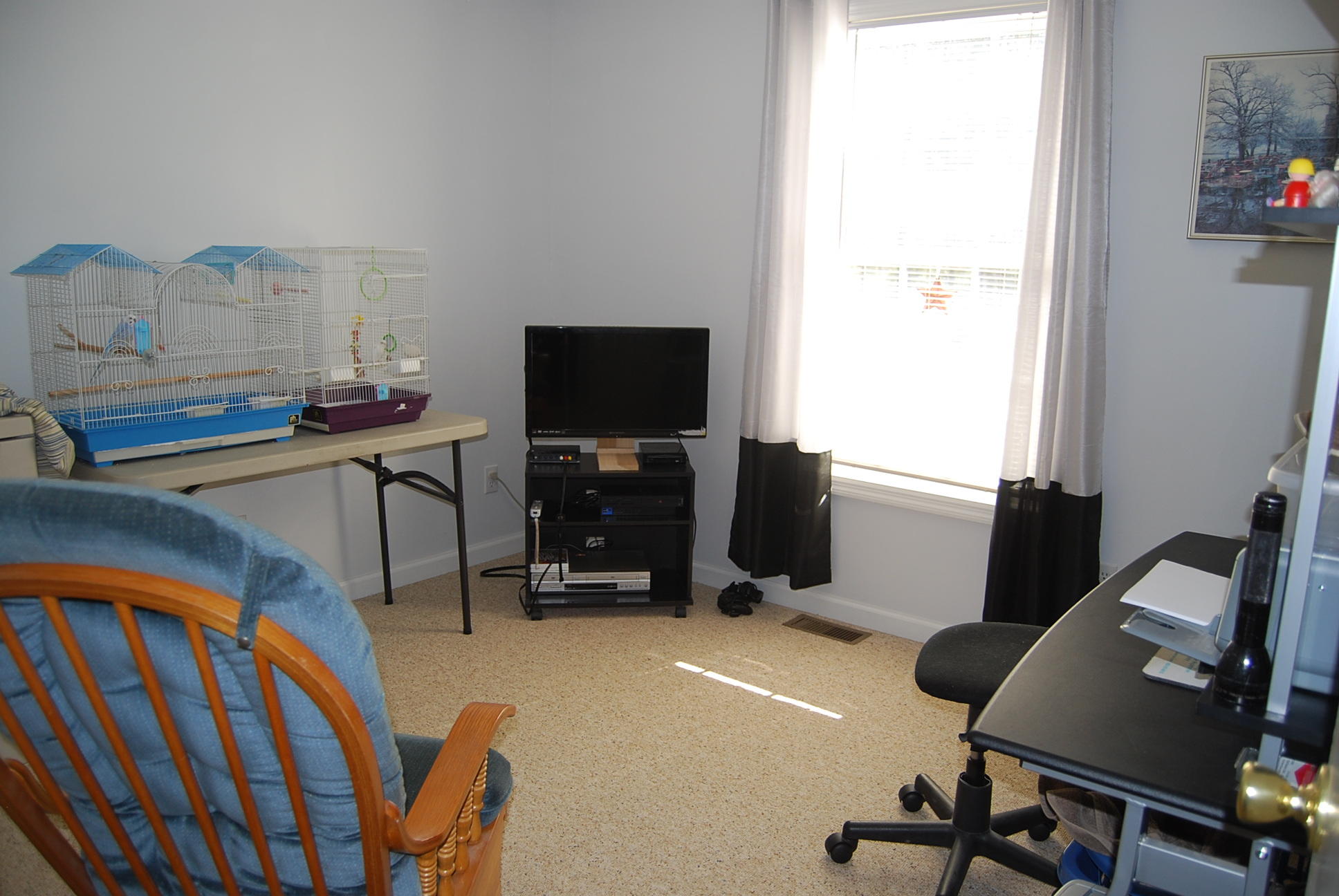 736 Holland Road Callaway, VA 24067 - Photo 17 of 45 a view of a workspace with furniture and a window