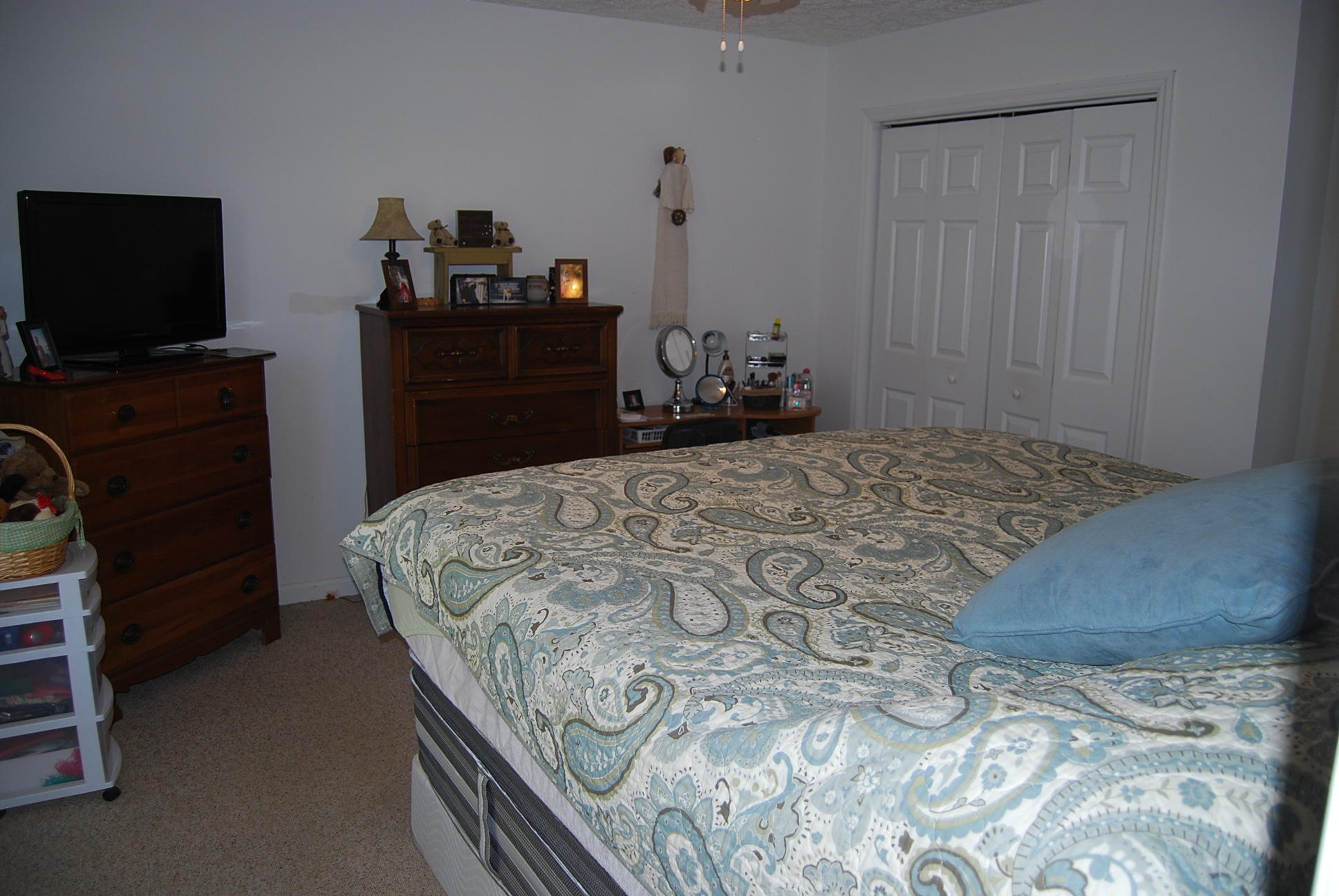 736 Holland Road Callaway, VA 24067 - Photo 19 of 45 a bedroom with a bed and flat tv screen on desk