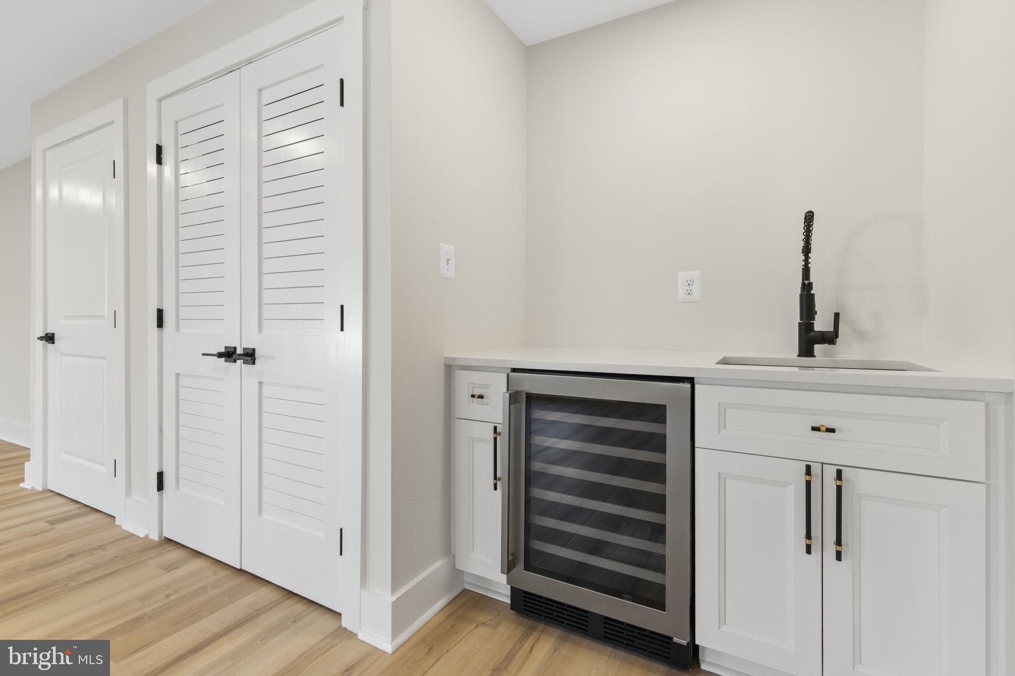 1108 Litchfield Road Baltimore, MD 21239 - Photo 42 of 109 a view of walk in closet with empty racks