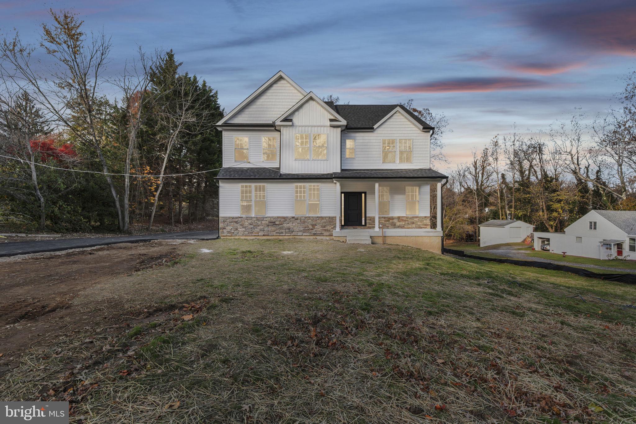 1108 Litchfield Road Baltimore, MD 21239 - Photo 48 of 109 a view of a house with a yard
