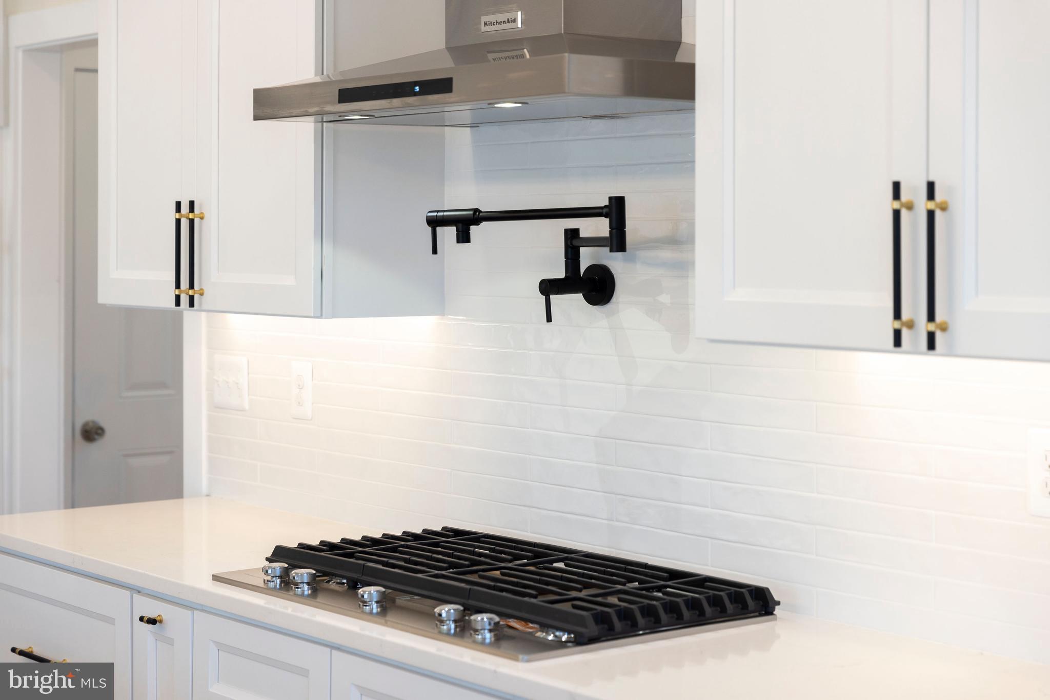 1108 Litchfield Road Baltimore, MD 21239 - Photo 57 of 109 a close view of a stove in a bathroom